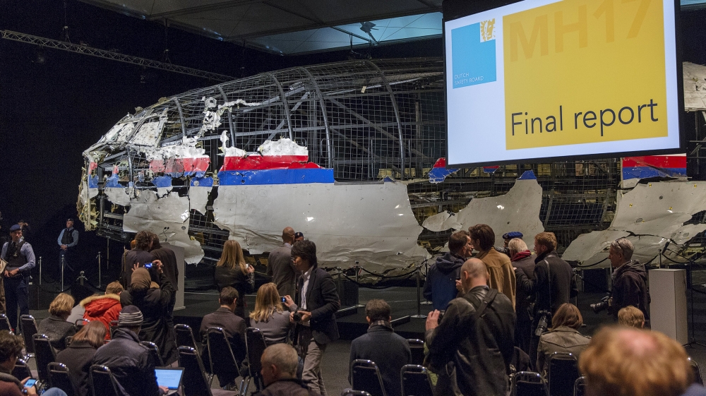 The reconstructed frame of Malaysia Airlines flight MH17 was shown at the presentation of the final report into the crash of July 2014 [Michael Kooren/Reuters]