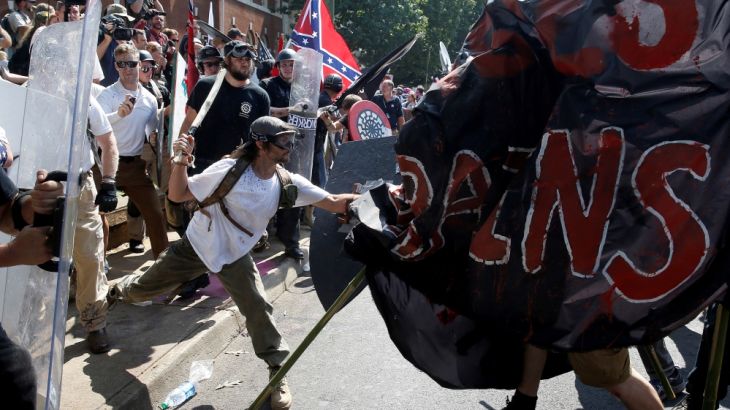 White supremacists clash with counter protesters at a rally in Charlottesville, Virginia
