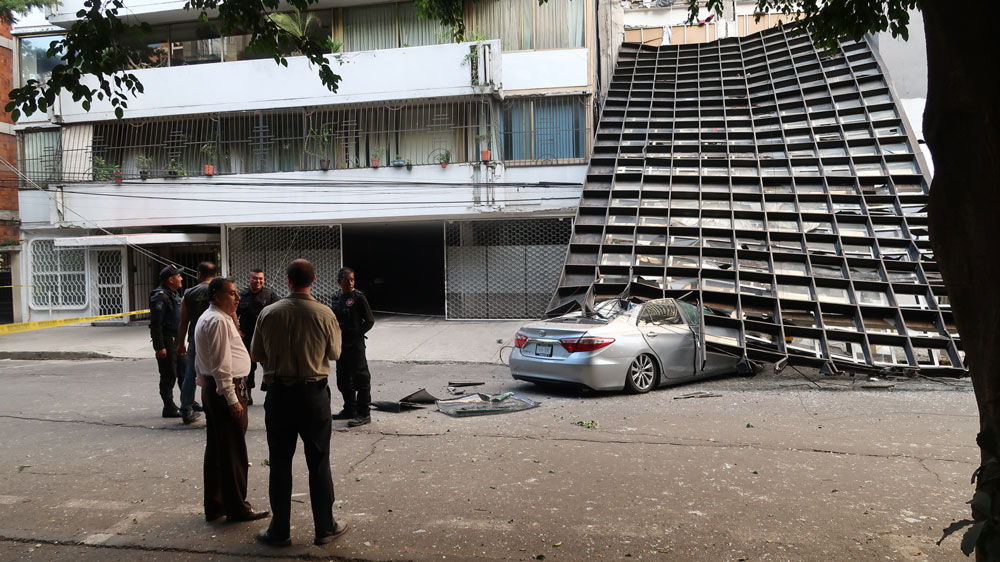 Dozens of buildings collapsed across central Mexico during the earthquake [Ali Rae/Al Jazeera]