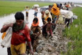 Rohingya Muslims fleeing violence.