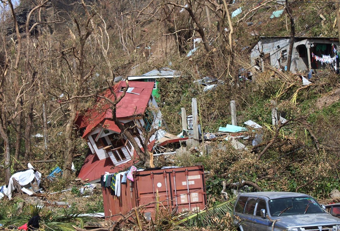 Homes lay scattered after the passing of Hurricane Maria in Roseau, the capital of the island of Dominica, Saturday, Sept. 23, 2017. Lives have been lost around the Caribbean, including on hard-hit Do