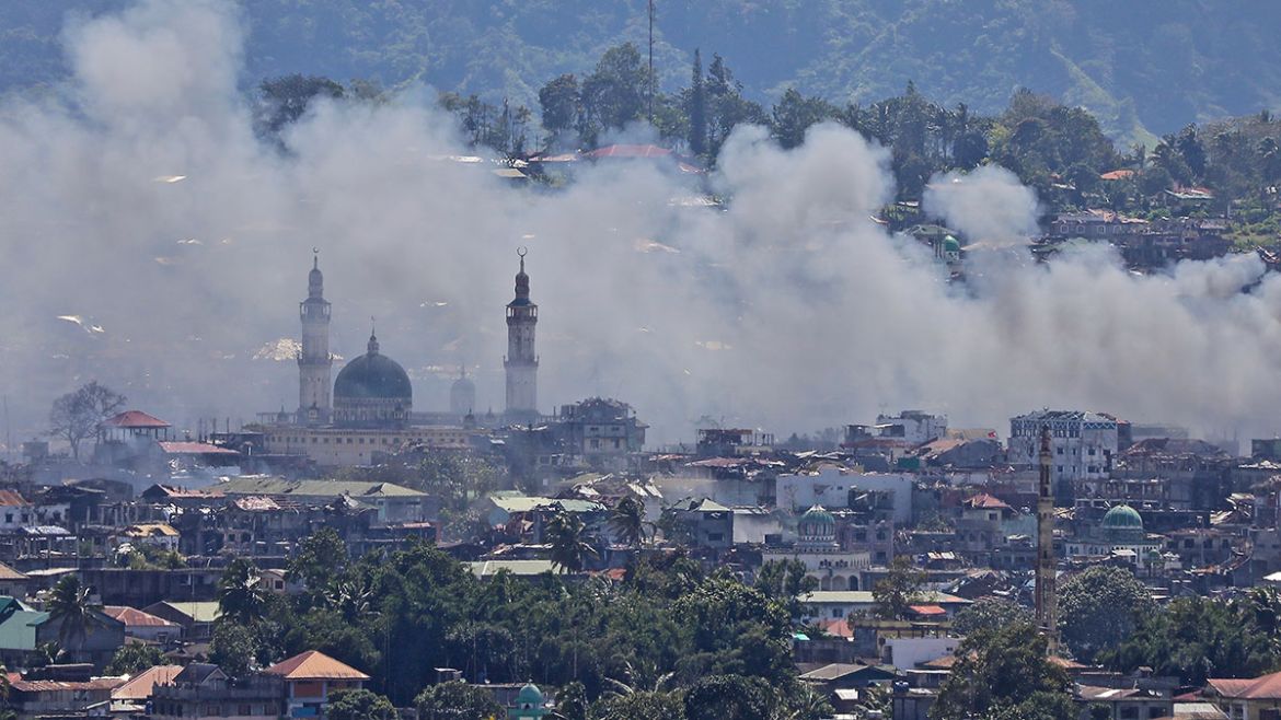 Smoke from heavy fighting billows across Marawi city. The centre of town was decimated as Philippine forces tried to retake the city.