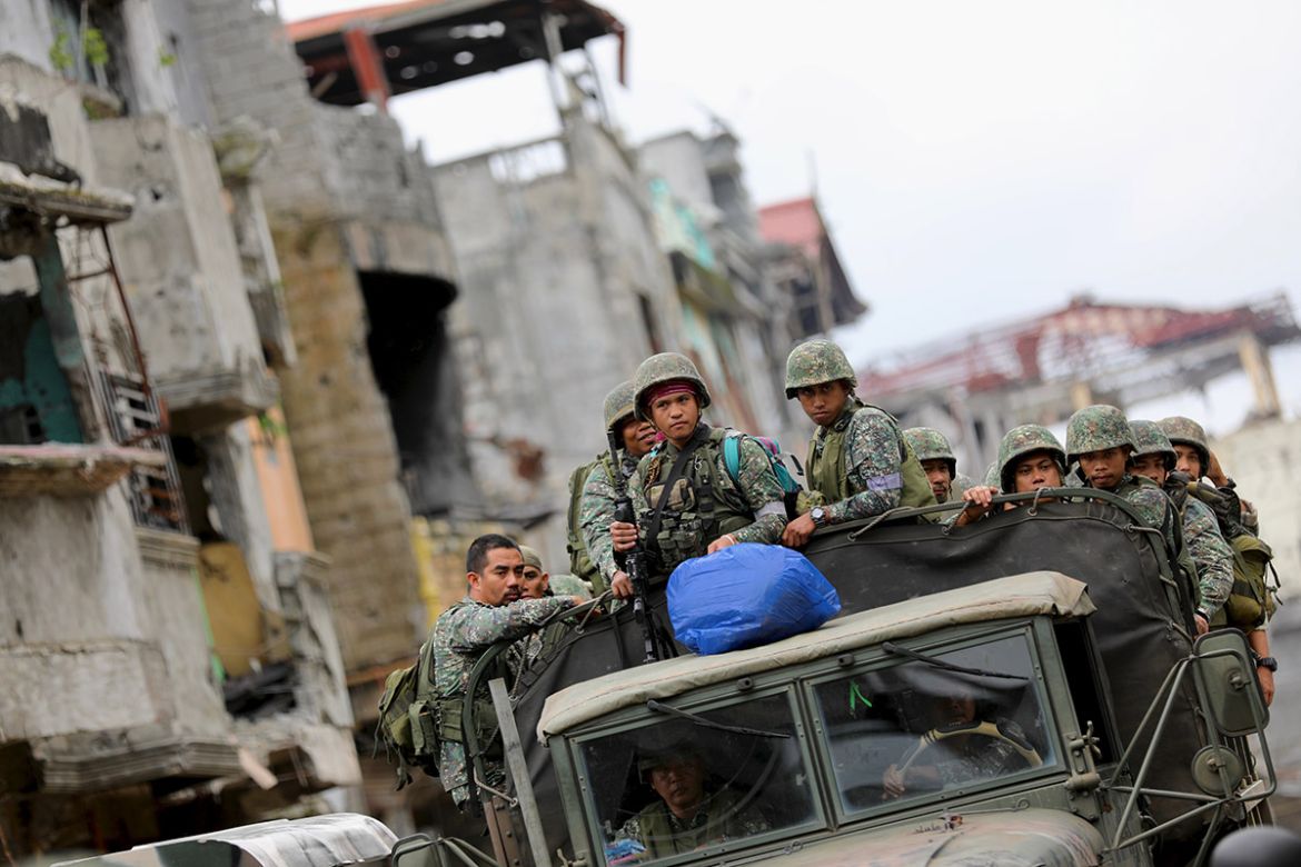 A squad of Philippine troops leaves the battlefield in Marawi for a few hours break. Soldiers spent five months on the frontlines engaging ISIL fighters in a bid to recapture the city.
