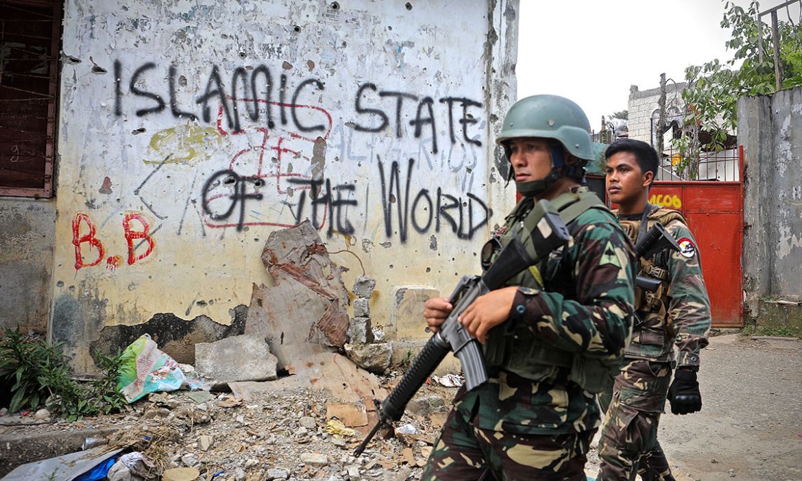 On May 23, hundreds of armed supporters of ISIL surprised the Philippine government and took over Marawi city in the country’s south. Spray painted messages show the group’s aim - to forge an Islamic