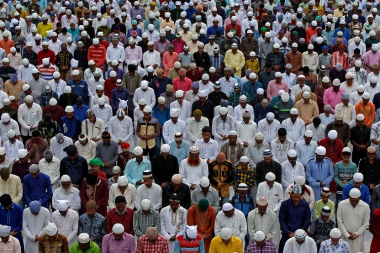 Muslims offer Eid al-Adha prayers inside the Sarkhej Roza mosque in Ahmedabad