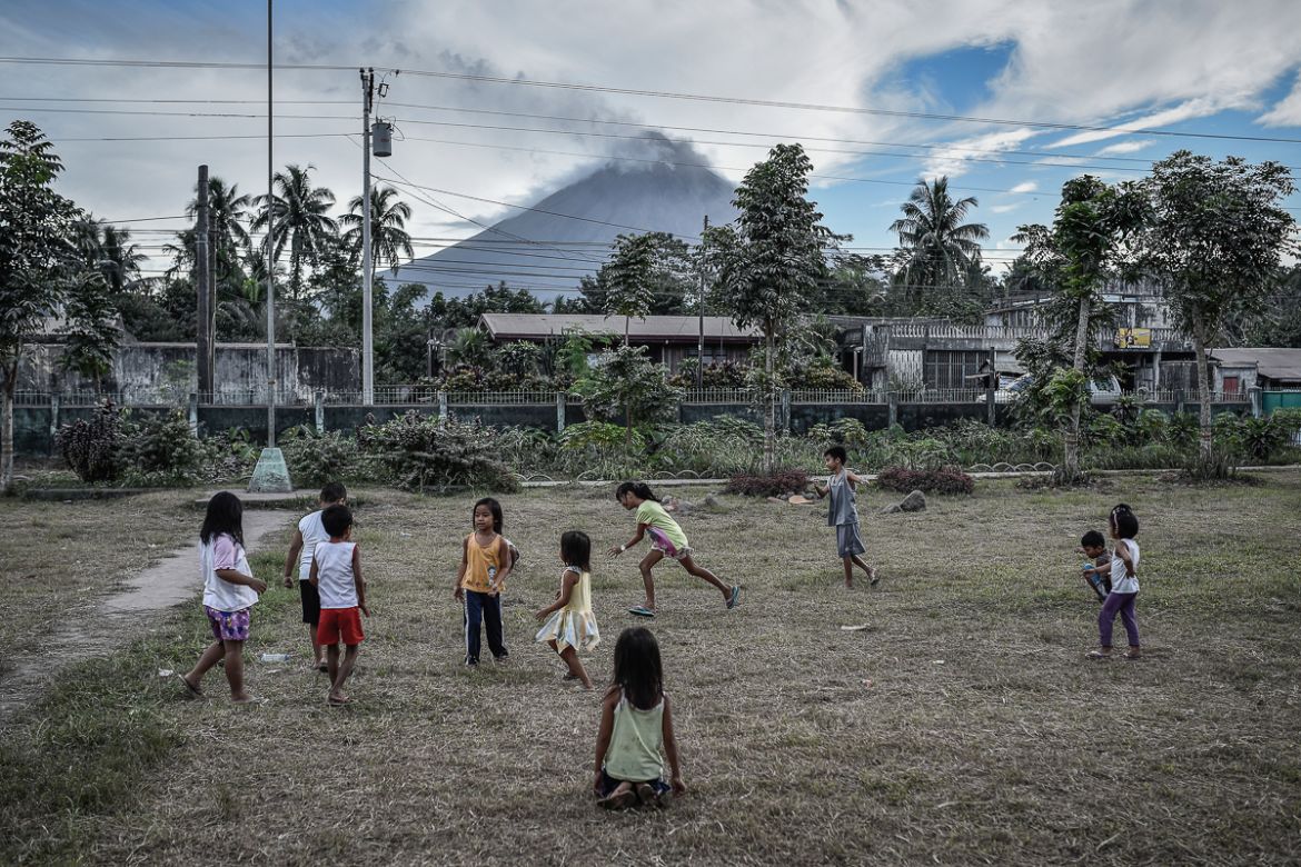 Children play at an evacuation center in Guinobatan, Albay province, Philippines, January 25, 2018.