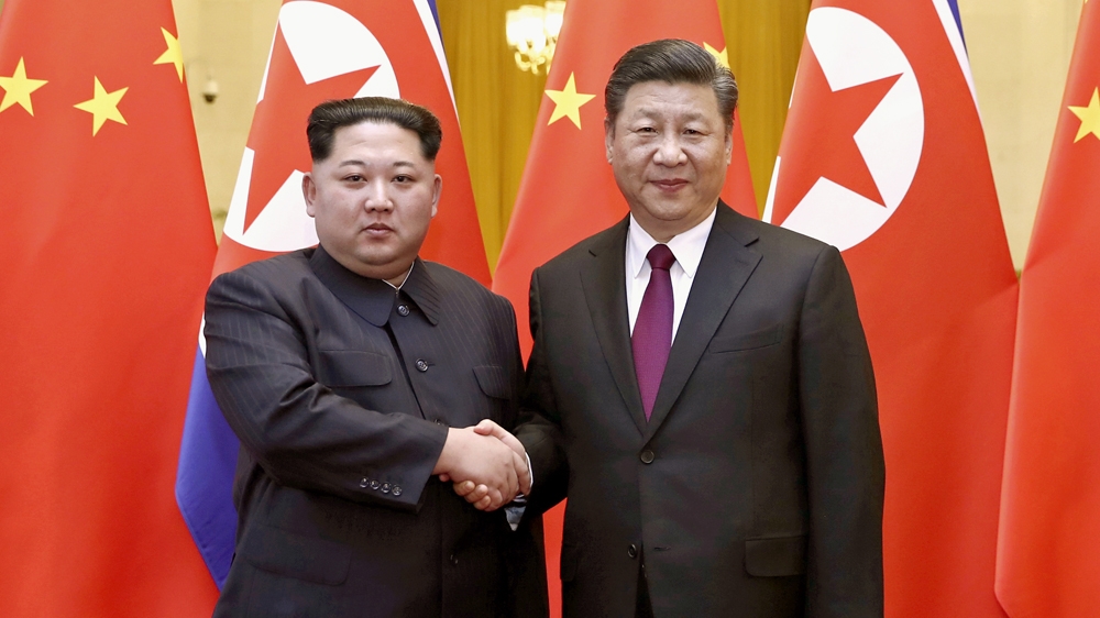 Xi held talks with Kim at the Great Hall of the People in Beijing [Xinhua via AP]