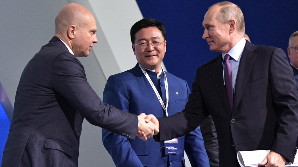 
Russian President Vladimir Putin is a regular guest of honour at the annual investor conference of VTB Bank, whose chairman is Yuri Soloviev [File: EPA]
