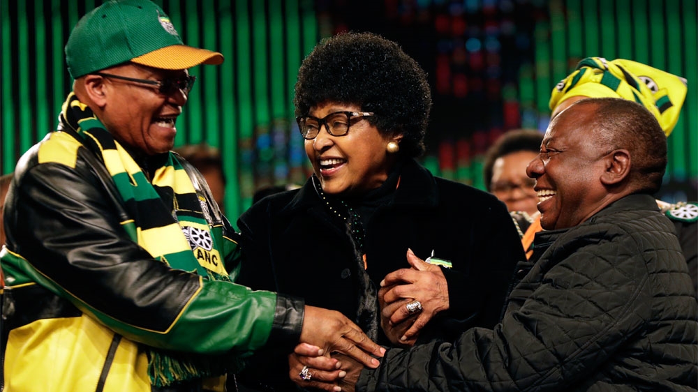 Winnie Mandela, centre, was for long a powerful figure in the governing ANC [AP]