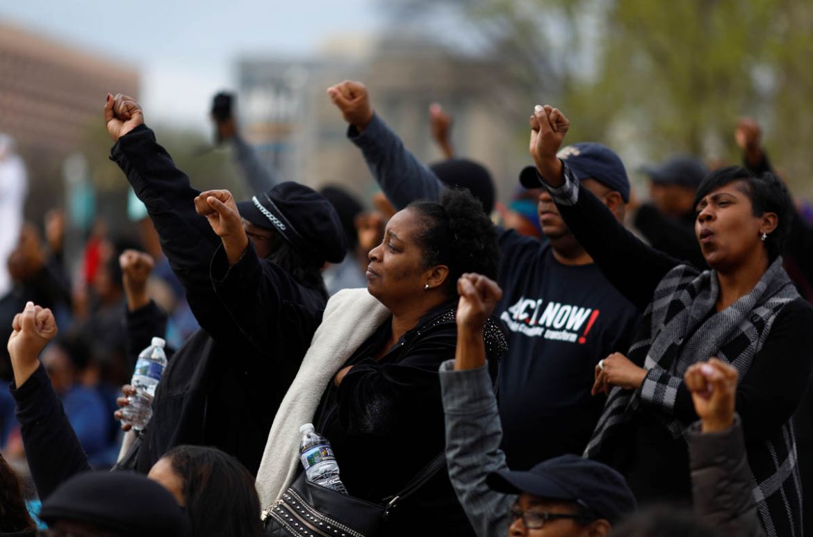 Attendees are seen during a silent march and rally on the National Mall to mark the 50th anniversary of the assassination of slain civil rights leader Rev. Martin Luther King Jr. in Washington, U.S.,
