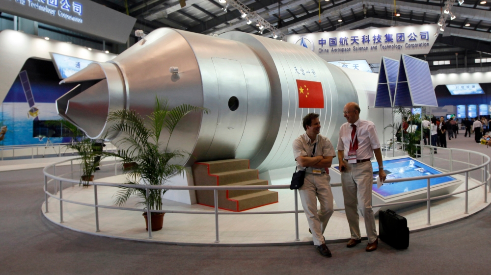 A model of China's Tiangong-1 space station at the 8th China International Aviation and Aerospace Exhibition in Zhuhai in the southern Guangdong Province [Kin Cheung/ The Associated Press]
