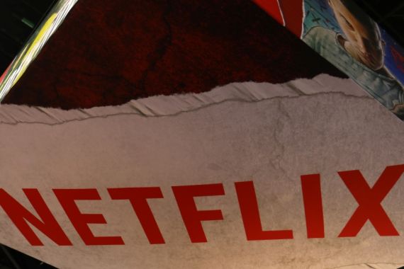 The Netflix logo is shown above their booth at Comic Con International in San Diego,
