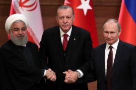 Presidents Rouhani of Iran, Erdogan of Turkey and Putin of Russia hold a joint news conference after their meeting in Ankara