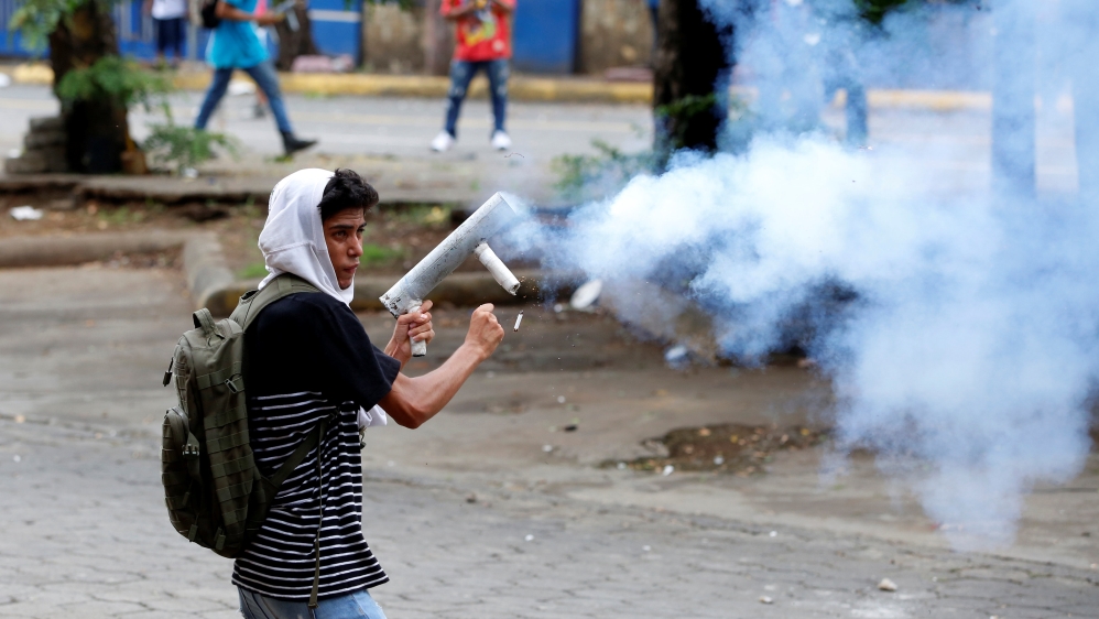 A demonstrator fires a homemade mortar towards the riot police during a protest against Nicaragua's President Daniel Ortega's government in Managua, Nicaragua [Reuters]