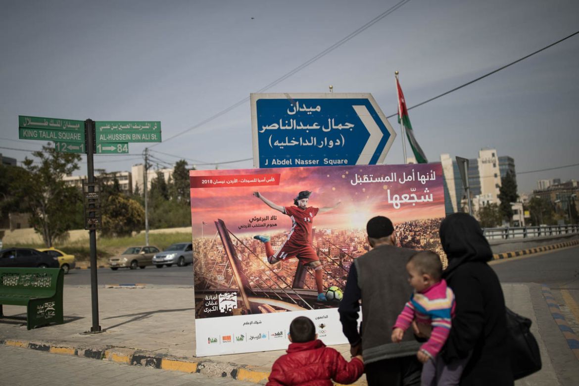 In the weeks leading up to the Asian Cup, giant billboards showing the Jordanian players were put up on Amman’s busiest intersections. This one depicts Tala Al Barghouti and reads “Because she is the