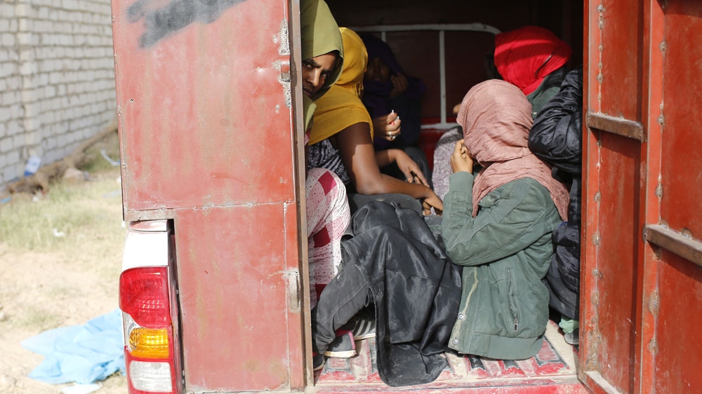 African migrants are transferred to a detention centre after being detained in Zawiya, northern Libya June 1, 2014 [Ahmed Jadallah/Reuters]