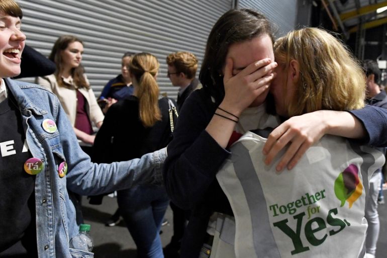 Activists react at the count centre as votes are tallied folowing yesterday''s referendum on liberalizing abortion law, in Dublin