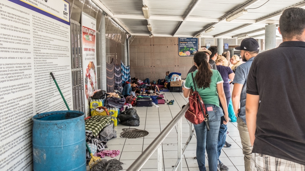 Only 10 families at a time are permitted to stay right by the Nogales port of entry to seek asylum [Eline van Nes/Al Jazeera] 
