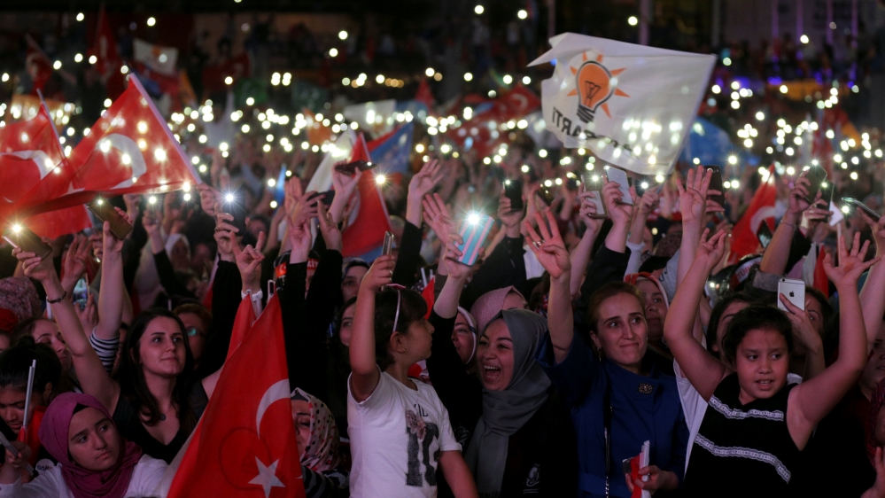 AK Party supporters celebrate in the capital, Ankara [Stoyan Nenov/Reuters]