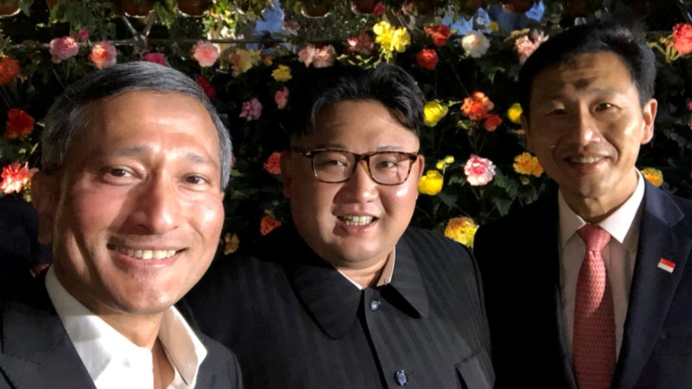 Accompanied by Singaporean cabinet ministers, Kim made an evening tour of sites in the city-state's waterfront on the eve of the summit [Vivian Balakrishnan's Twitter page/via Reuters]