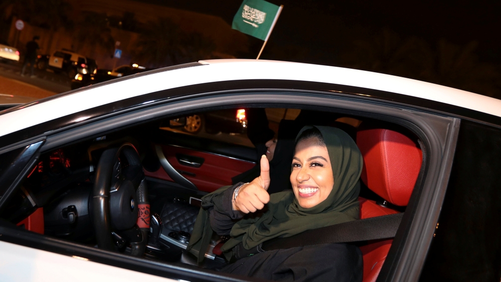 A Saudi woman celebrates as she drives her car in al-Khobar [Hamad I Mohammed/Reuters]
