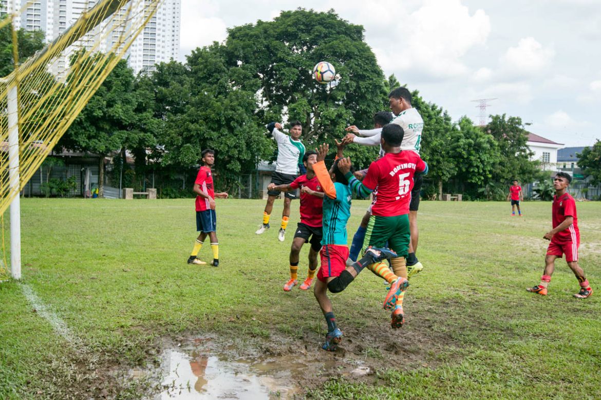 RFC scores a goal against RFM in a football match that ended with the score of 3-3. Both teams aimed to showcase their talent and gain recognition for the Rohingya community.
