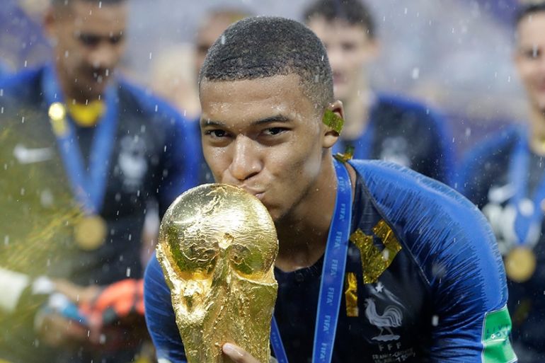 France''s Kylian Mbappe kisses the trophy after the final match between France and Croatia at the 2018 soccer World Cup in the Luzhniki Stadium in Moscow, Russia, Sunday, July 15, 2018. France won the