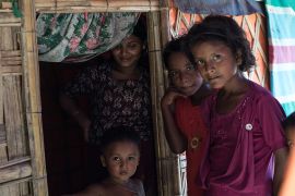 Rohingya family in Balukhali camp [Sorin Furcoi/Al Jazeera]