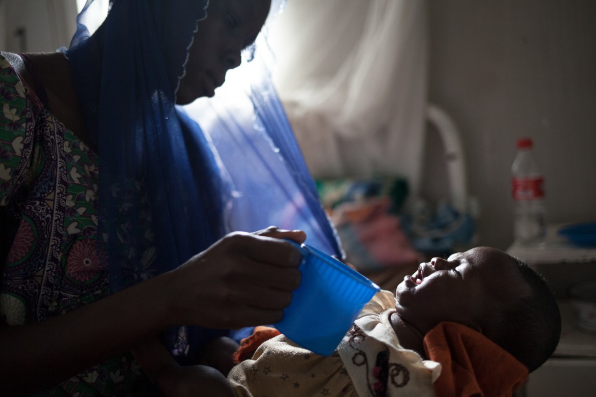 Adama Bichara takes care of her first child Hawa Moussa, 5 months old. He was sick for two days before she brought him to the hospital ten days ago. Hawa suffers from severe acute malnutrition, febril