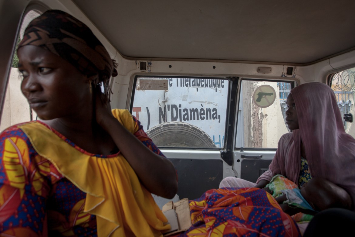 A worried women arrives in ambulance to the Chad-China Friendship hospital.