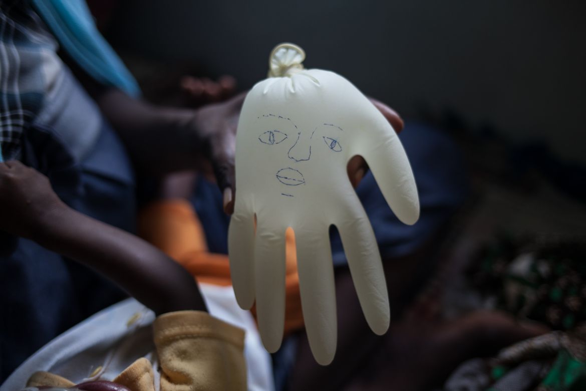 A doctor made a glove-toy for little Aboubakar Ahmad.
