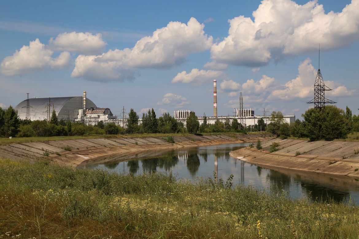 Nuclear reactors and the cooling pond at the Chernobyl power plant, site of the explosion and fire on April 26, 1986. The destroyed reactor No. 4 is covered in steel (pictured left). Other reactors at