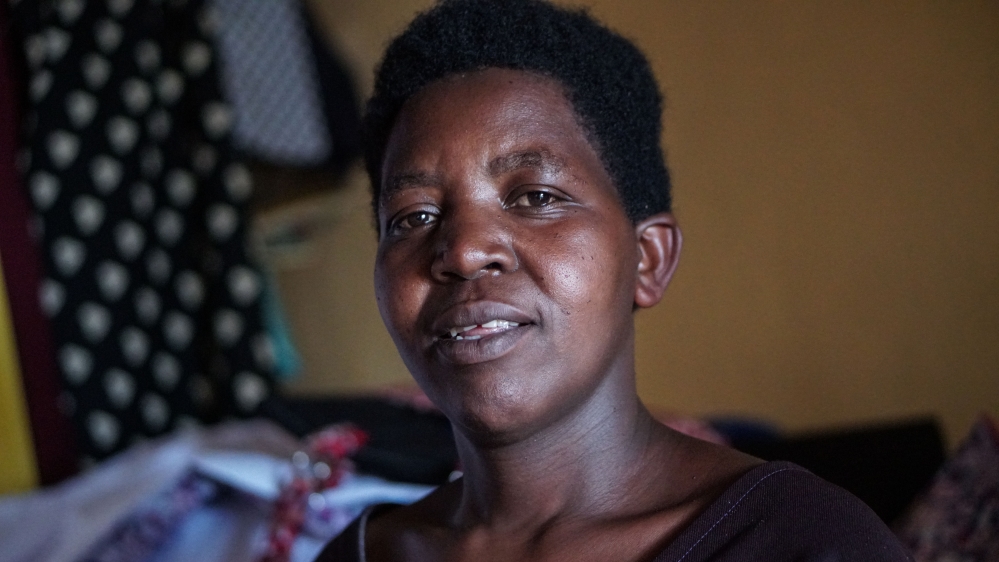 Mukanyarwi Serafina, a tailor in southern Rwanda, says demand for clothing will increase and is looking forward to expanding her skills [Azad Essa/Al Jazeera]