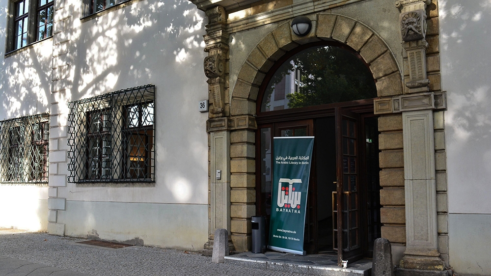 Baynatna's entrance in Mitte, Berlin's central district [Marta Vidal/Al Jazeera]