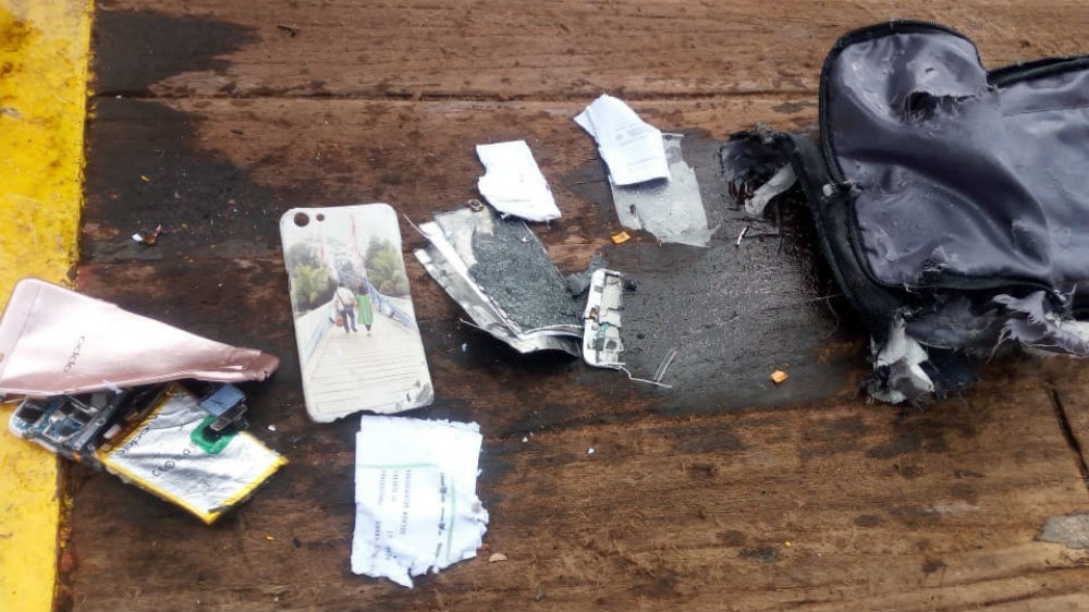 Mobile phones among the debris found floating in the sea on Monday [Courtesy: National Disaster Mitigation Agency] 