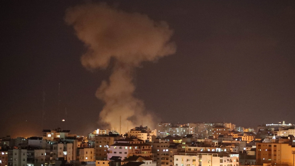 Smoke rises following an Israeli air raid in Gaza [Suhaib Salem/Reuters]