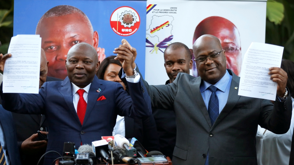 Tshisekedi (right) and Kamerhe (left) have promised to crack down on corruption [Baz Ratner/Reuters]