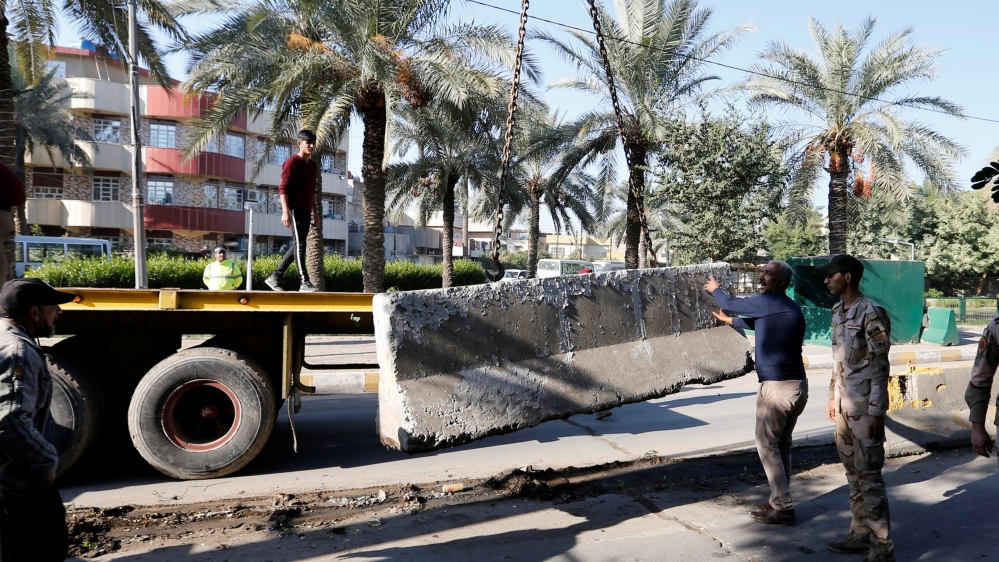 The mayoralty of Baghdad has worked with the Iraqi security forces to lift kilometres of blast walls across the Green Zone for several weeks [Reuters]