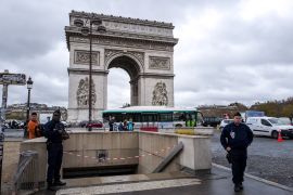 Members of the French Police protect access to the world famous Arc du Triomphe, closed to the public after being vandalized during last Saturdayi´s protest on December 03, 2018 in Paris, France. The