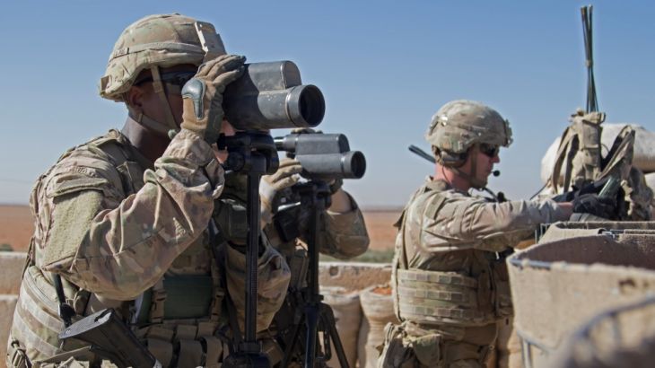 U.S. Soldiers surveil the area during a combined joint patrol in Manbij