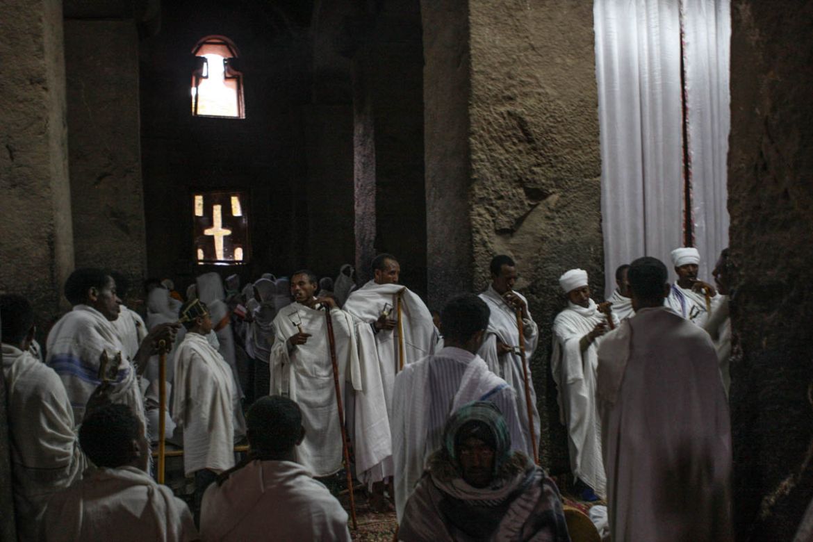 Worshippers inside Bet Medhane Alem. Despite deep reverence shown for the Ethiopian Orthodox Tewahedo Church and its priests, people have concerns about church authorities don’t use any of the money g
