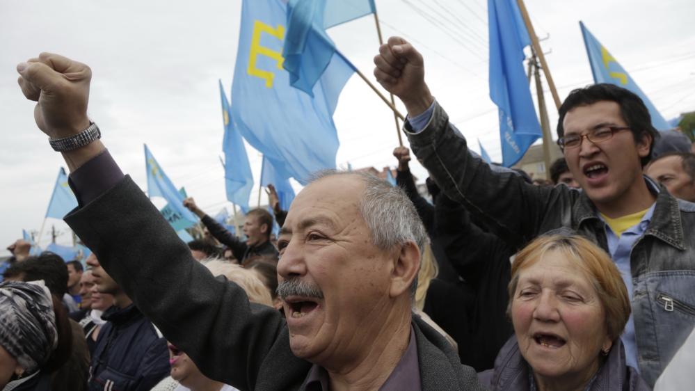Every year, Crimean Tatars commemorate Stalin's mass deportation of their ancestors [Max Vetrov/AP] 