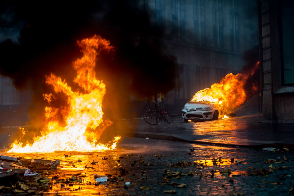 Several fires are seen on a street near the Champs ElysE`es during a protest organized by the i`Gilets Jaunesi^ movement on December 01, 2018 in Paris, France. Photo by Omar Havana