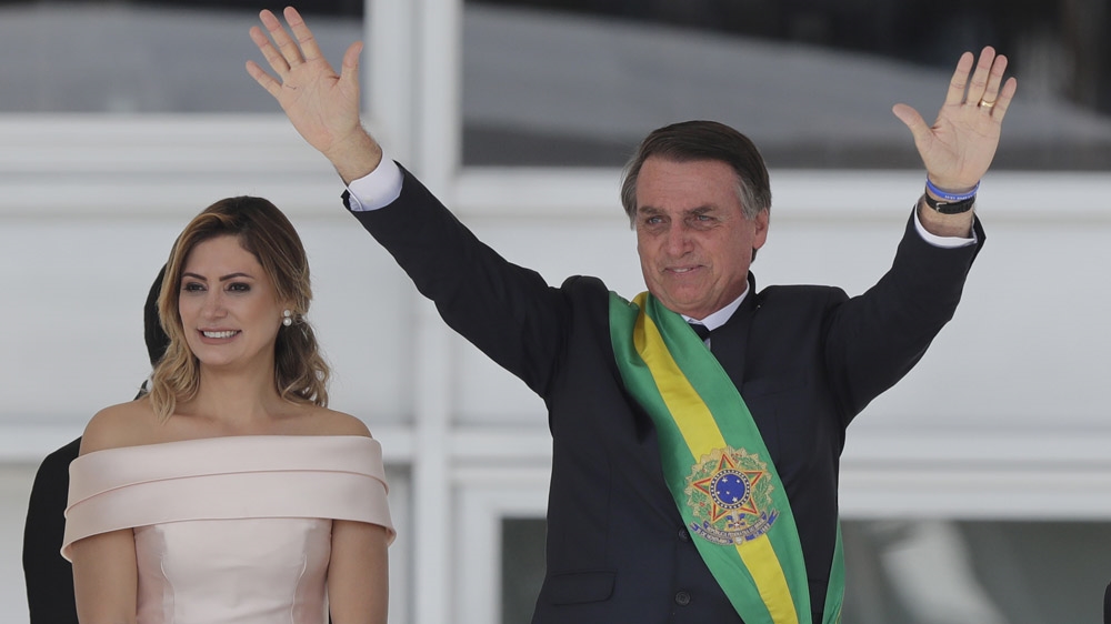 Jair Bolsonaro has courted controversy by criticising minorities [File: Silvia Izquierdo/AP Photo]