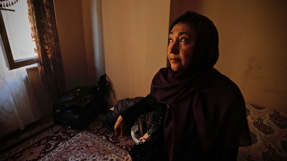 Gulbakar Jaliloua is a Muslim Uighur and citizen of Kazakhstan. She says she was detained for more than a year by the Chinese authorities when she made a business trip to China. [Steve Chao/Al Jazeera]