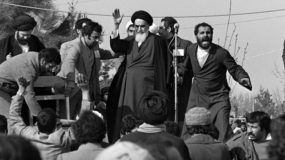 When asked how he felt about coming home, Khomeini reportedly said: 'Nothing' [Gabriel Duval/AFP]