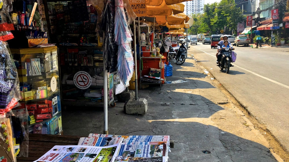 Chea Vichea was shot as he browsed the papers at this roadside stall in Phnom Penh [Andrew Nachemson/Al Jazeera]