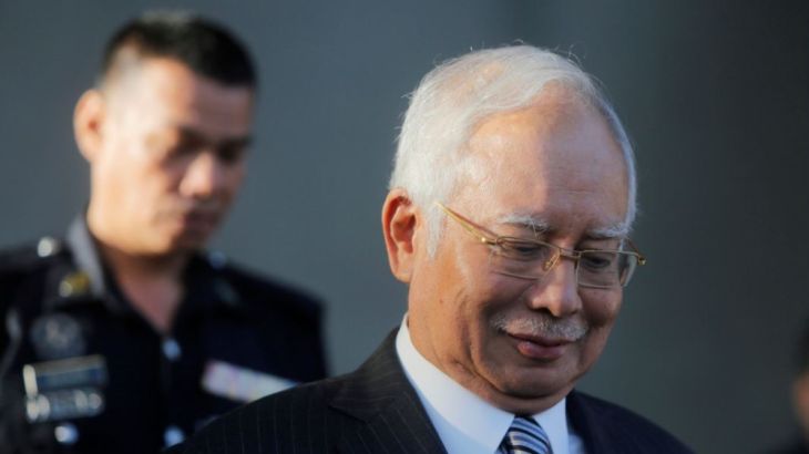 Former Prime Minister Najib Razak walks out of Kuala Lumpur High Court in Kuala Lumpur, Malaysia