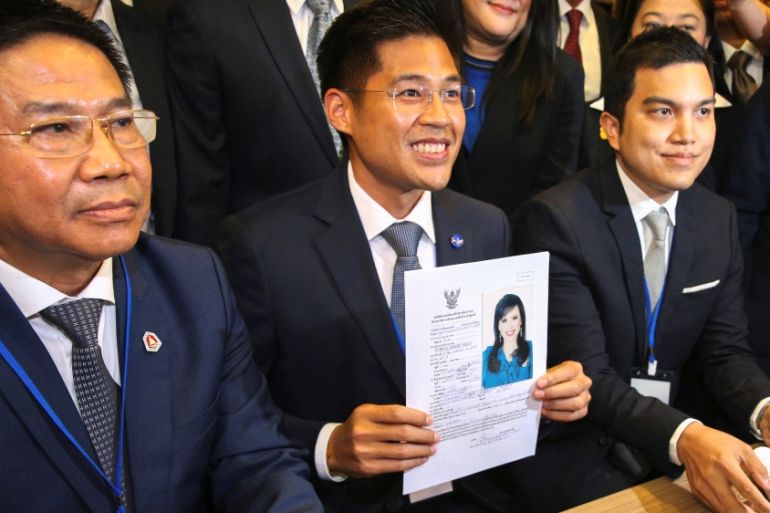 Thai Raksa Chart party leader Preechapol Pongpanich, holds up application of candidate for Prime Minister, Thailand''s Princess Ubolratana Rajakanya Sirivadhana Varnavadi, at the election commission of