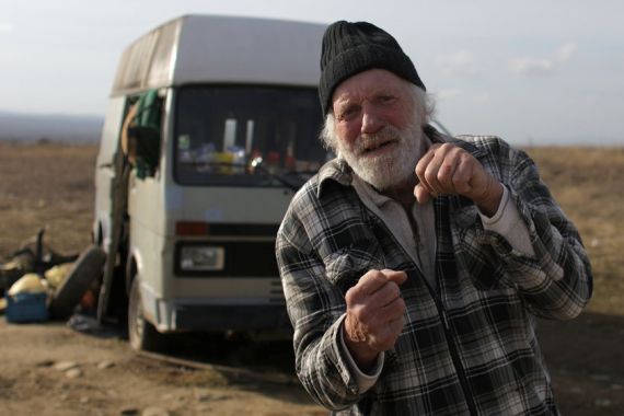 Former Dutch boxer Lubbers gathers his belongings from the van where he and his partner were living for the last eight months near Kosharitsa